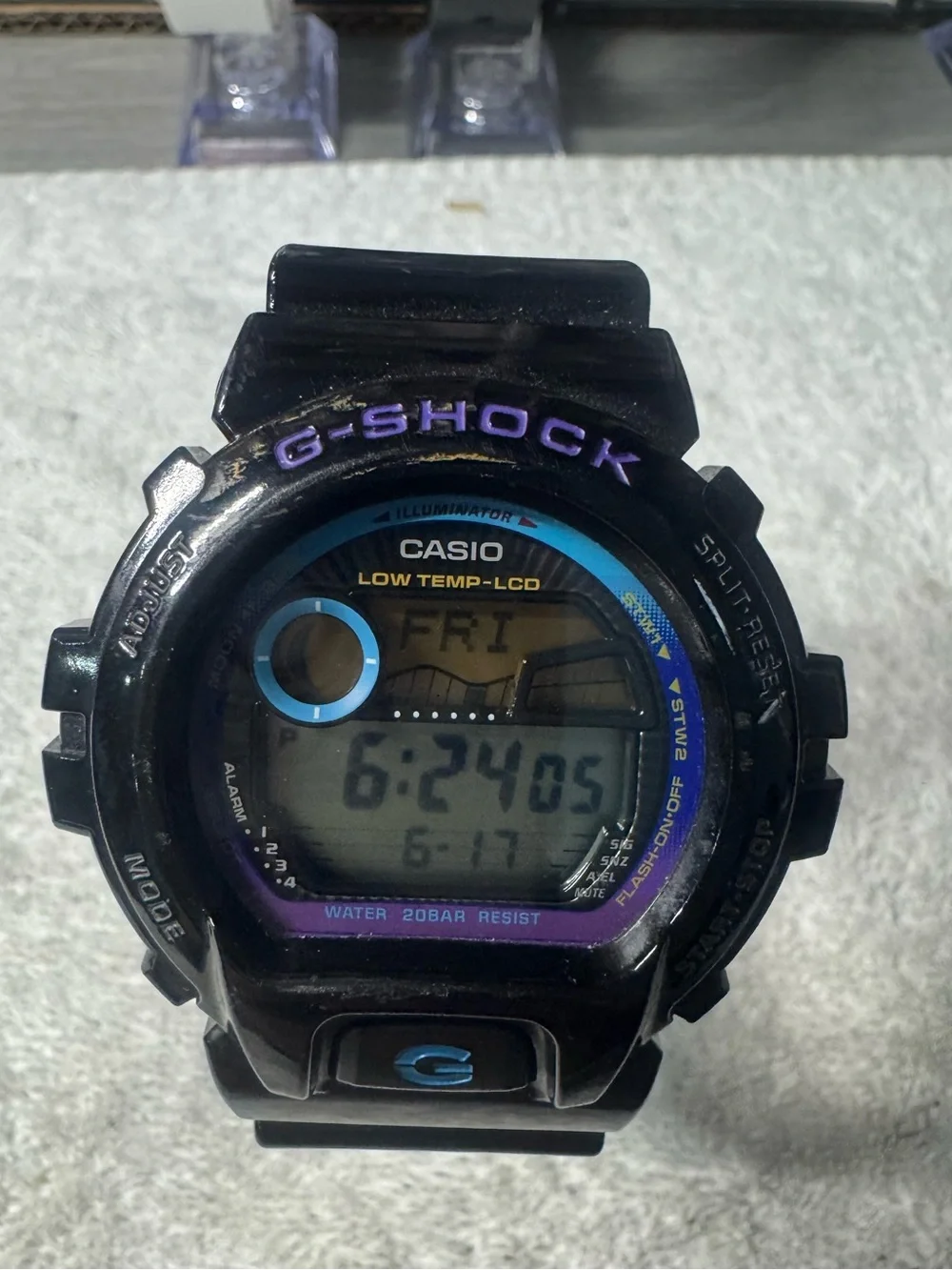 Casio Black G-Shock Watch with Blue and Purple Accents